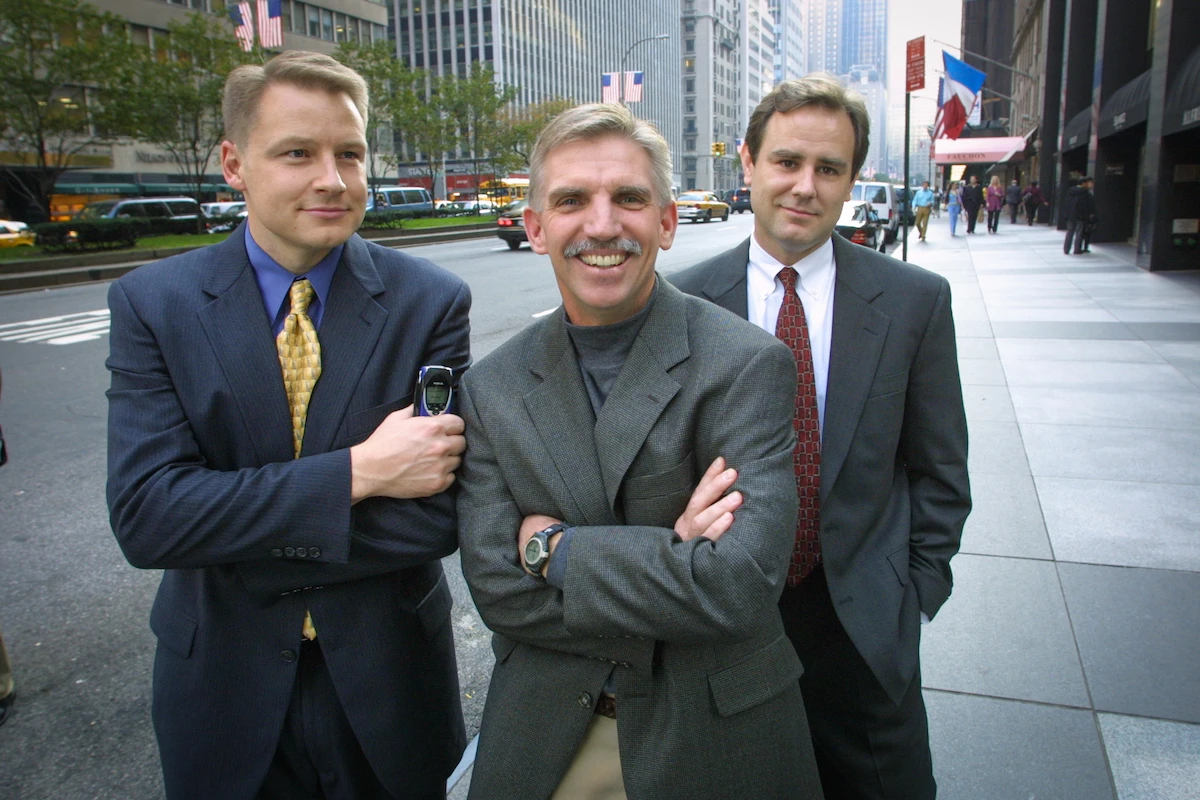 Three founders of Journey Group posing together in New York City